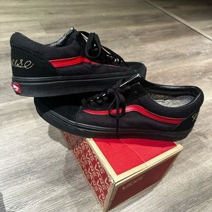 Mickey Mouse low-top vans 
Size 10.5